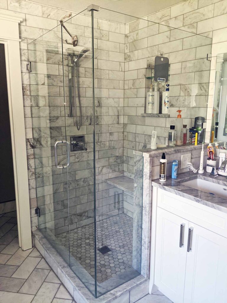 Bathroom remodeling: they changed to our frameless glass shower.